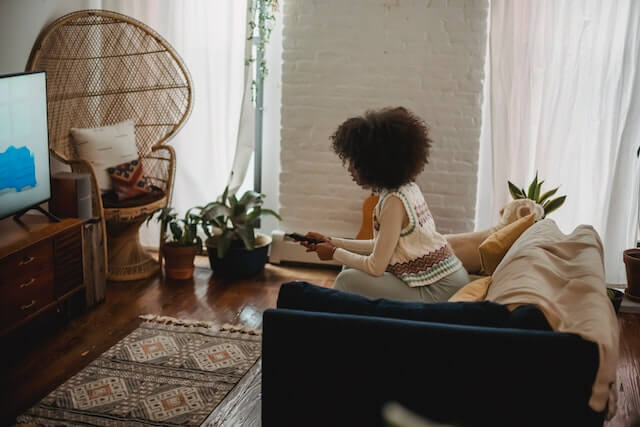 Young lady watching a free-to-air channel